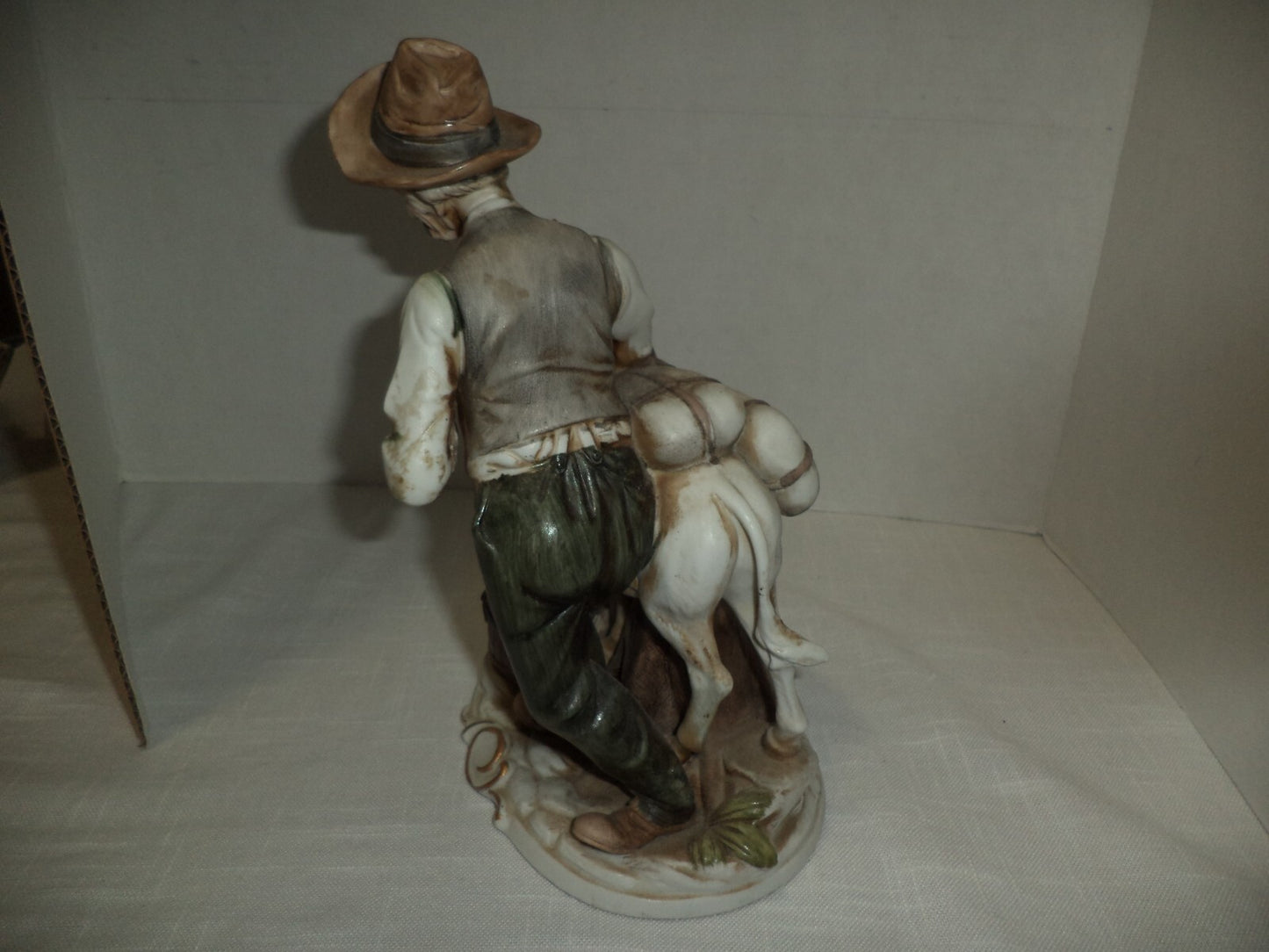 Man With Mule Porcelain Figurine