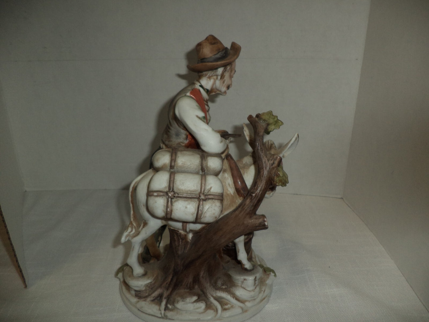 Man With Mule Porcelain Figurine