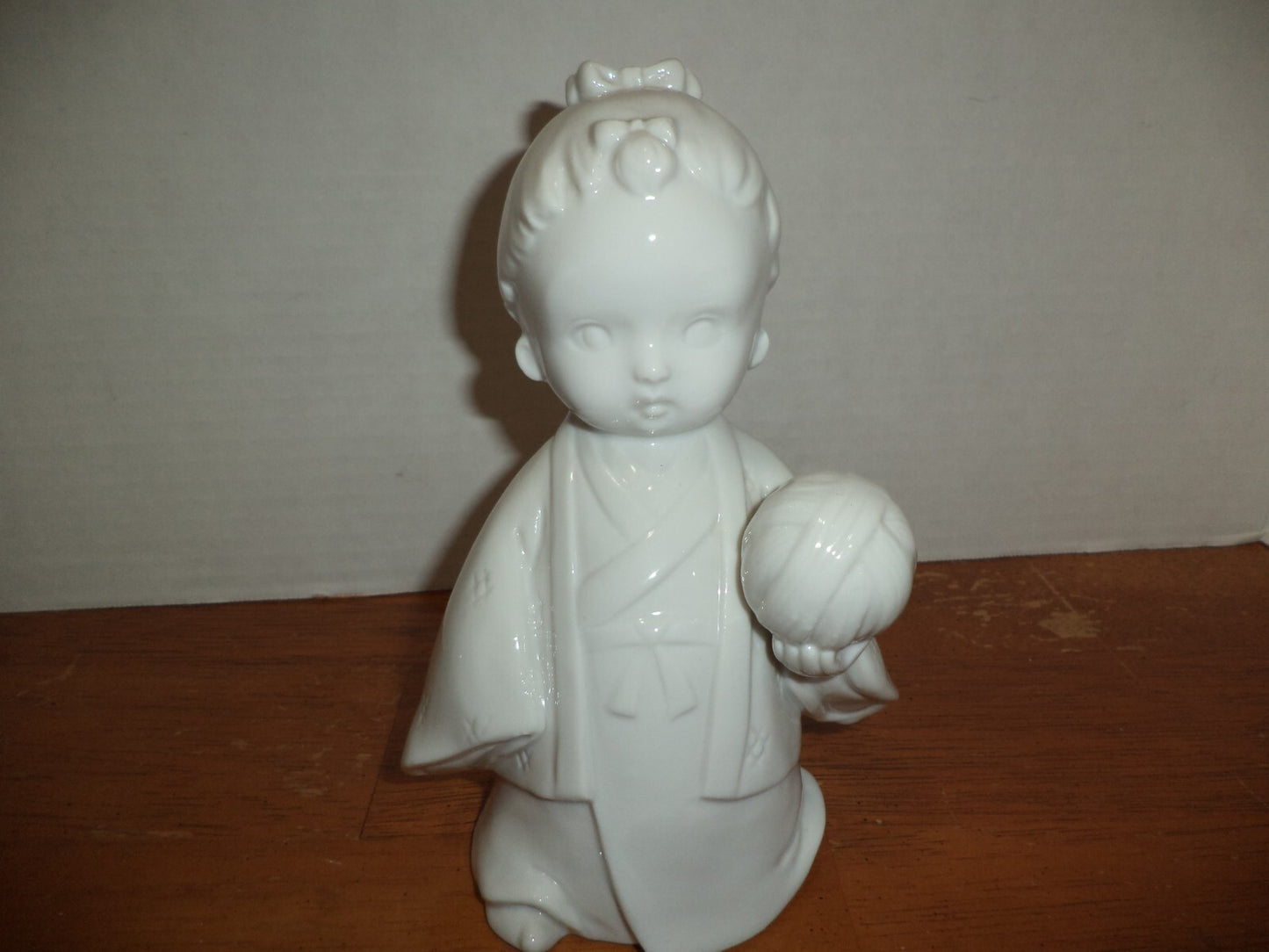 Tradional White Porcelain Japanese Girl With Globe