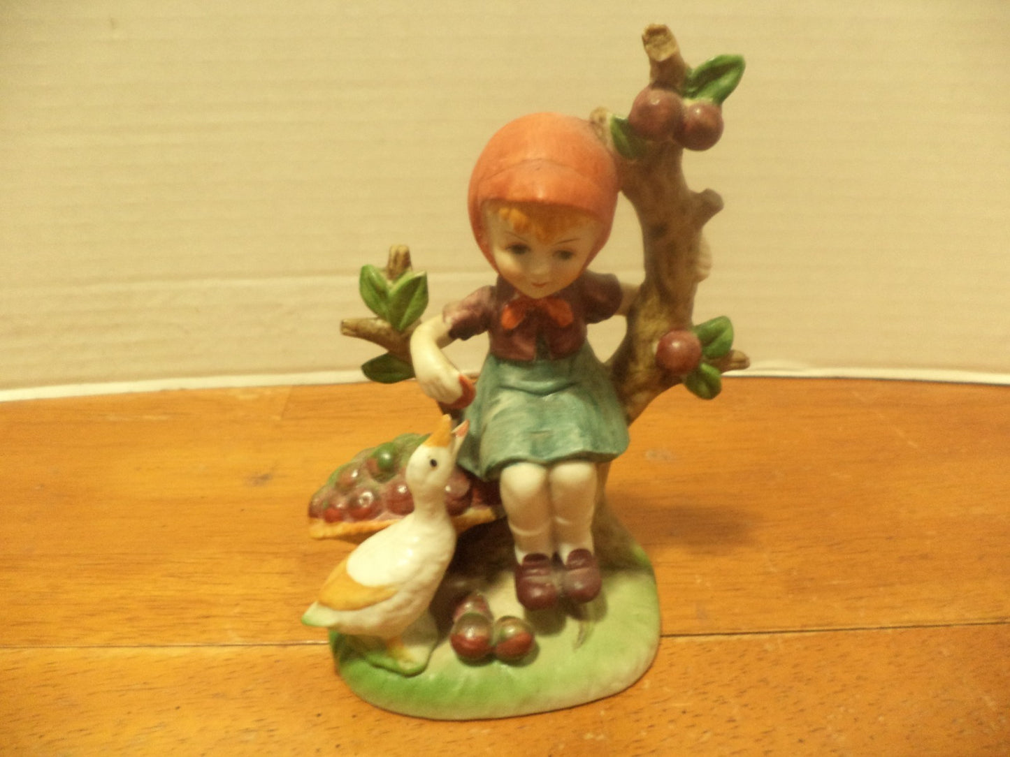 Girl Sitting In A Apple Tree Feeding A Duck Figurine