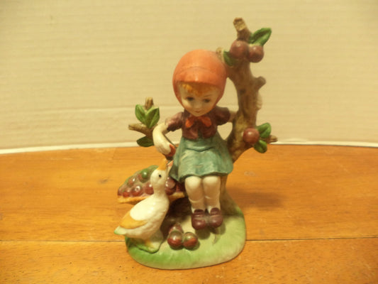 Girl Sitting In A Apple Tree Feeding A Duck Figurine