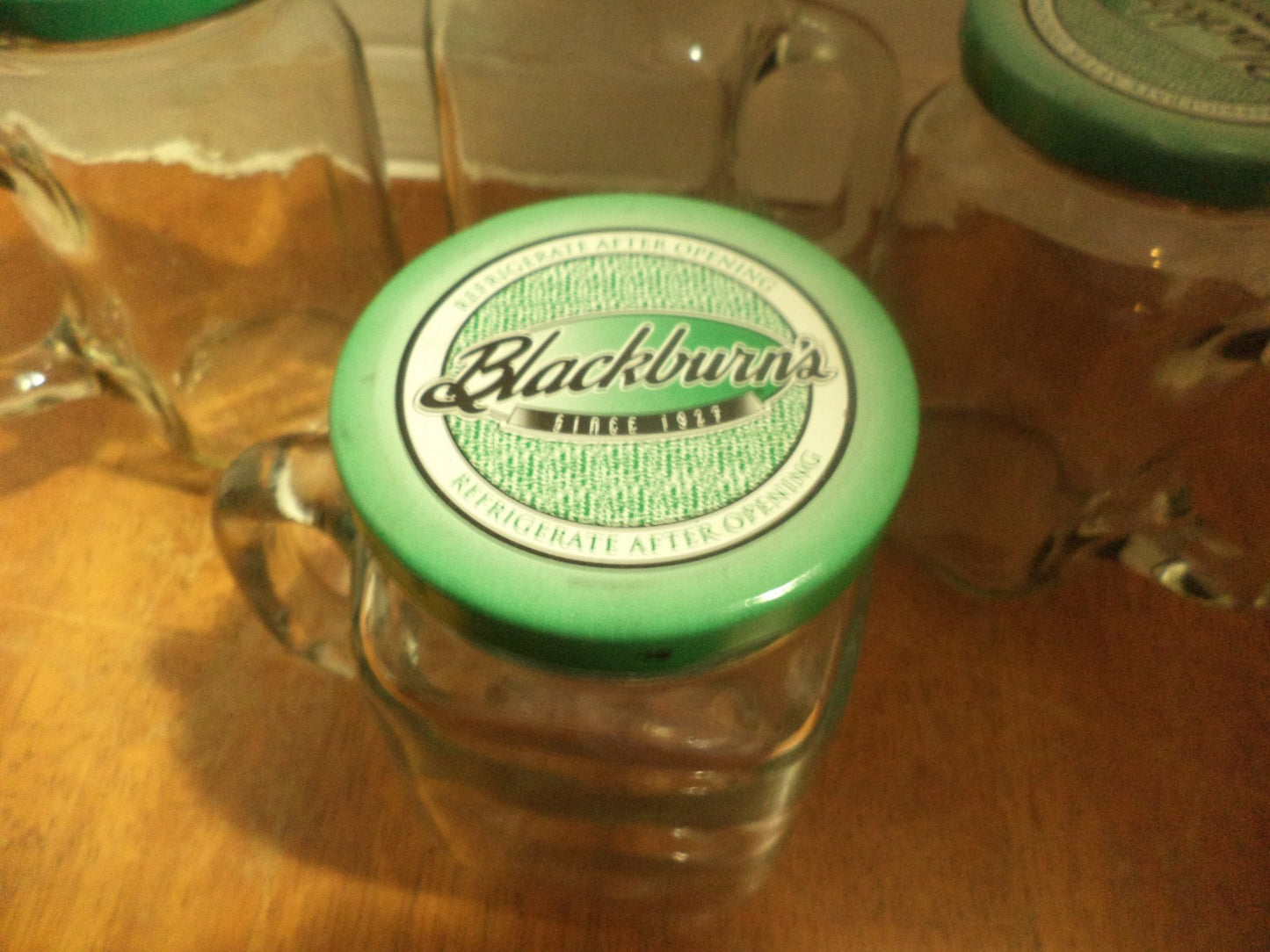 4 Blackburns July W/ Handles and Lids Glass Jars