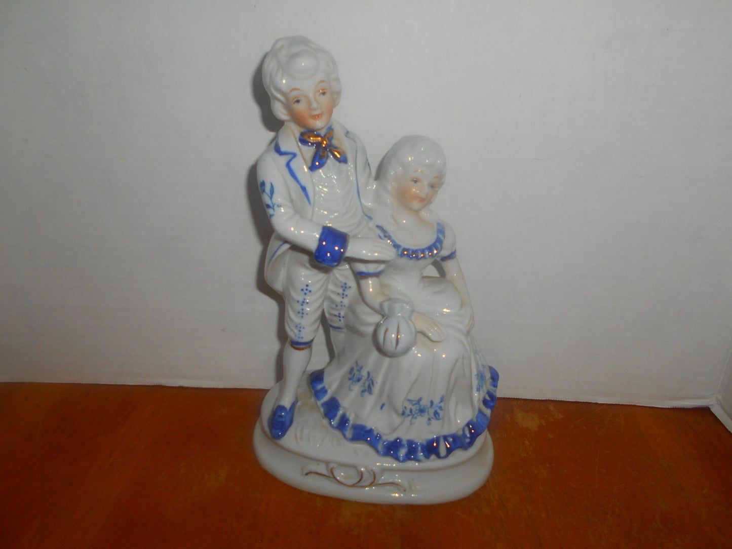 Porcelain Colonial Man & Lady Figurine
